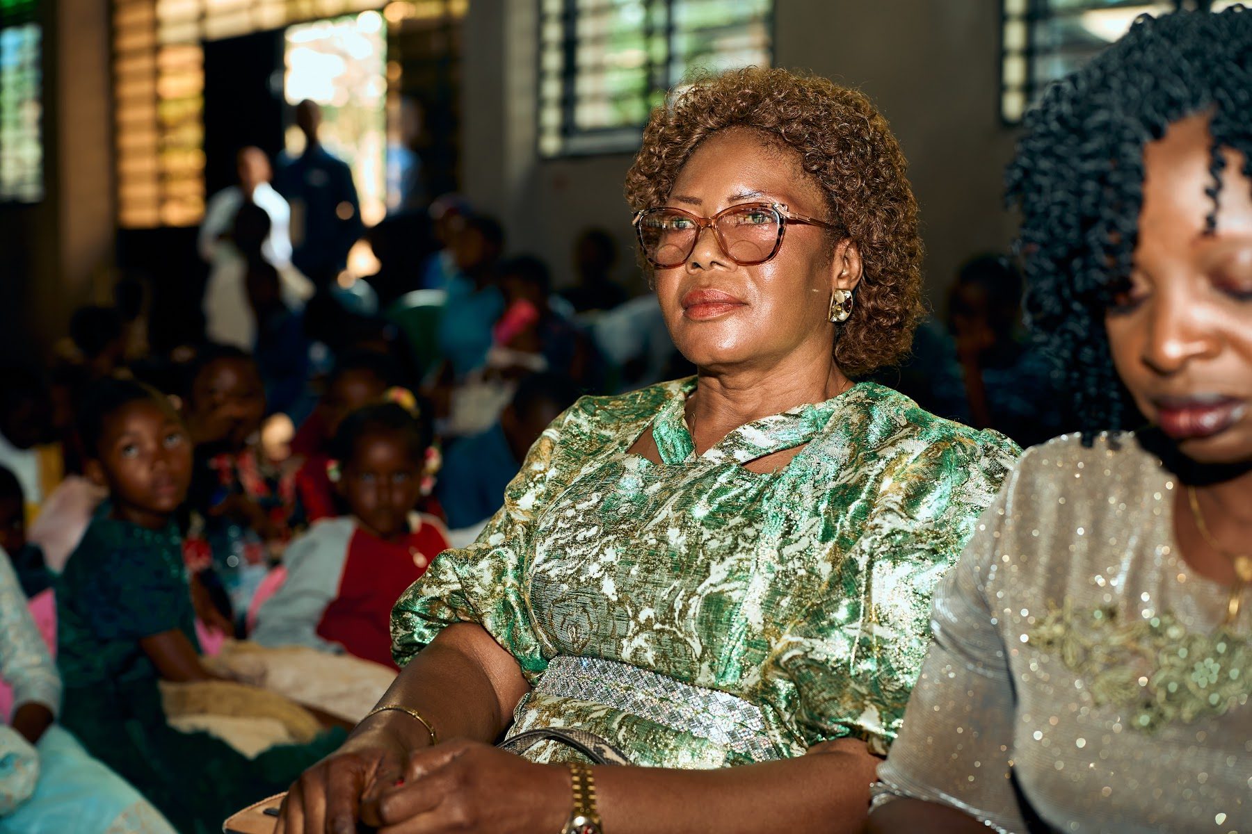 Women of the church seated together in the sanctuary